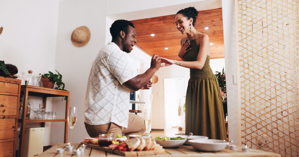 happy couple proposing at home